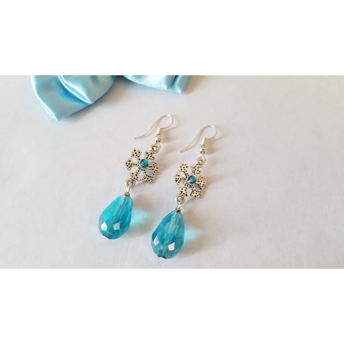 Snowflake Earrings with Blue Dangling